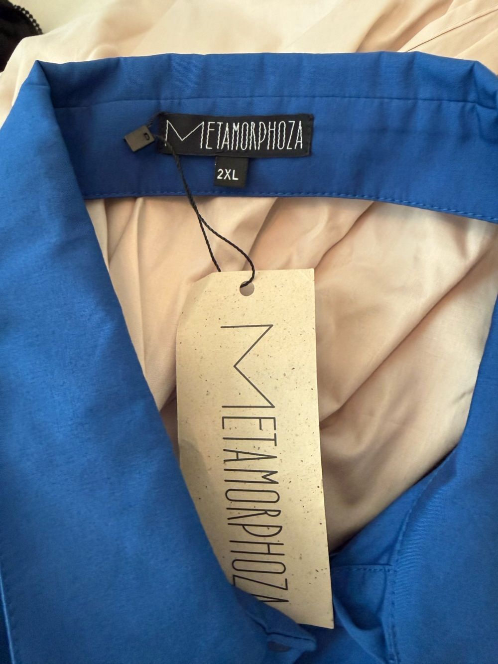 METAMORPHOZA
ASYMMETRIC SHIRT WITH OPEN BACK
jj2 - Picture 7 of 7